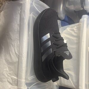 Adidas women’s Black Sneakers with Silver Stripes